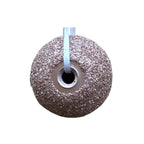 High-grit contour wheel with central mounting hole for rotary tools