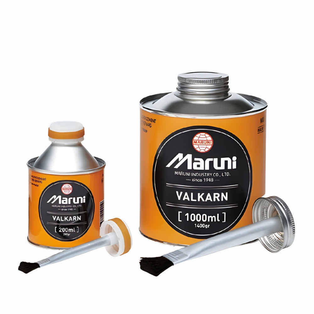 Two cans of Maruni Valkarn with applicators on a white background