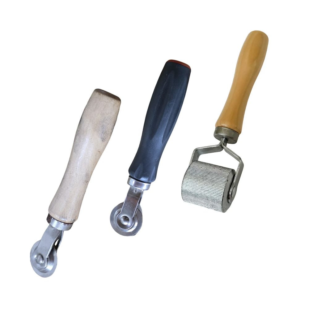 Assorted roller stitchers for tyre repair work